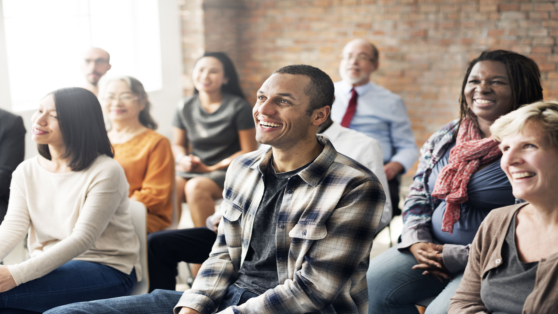 Photo of people attending a discussion.
